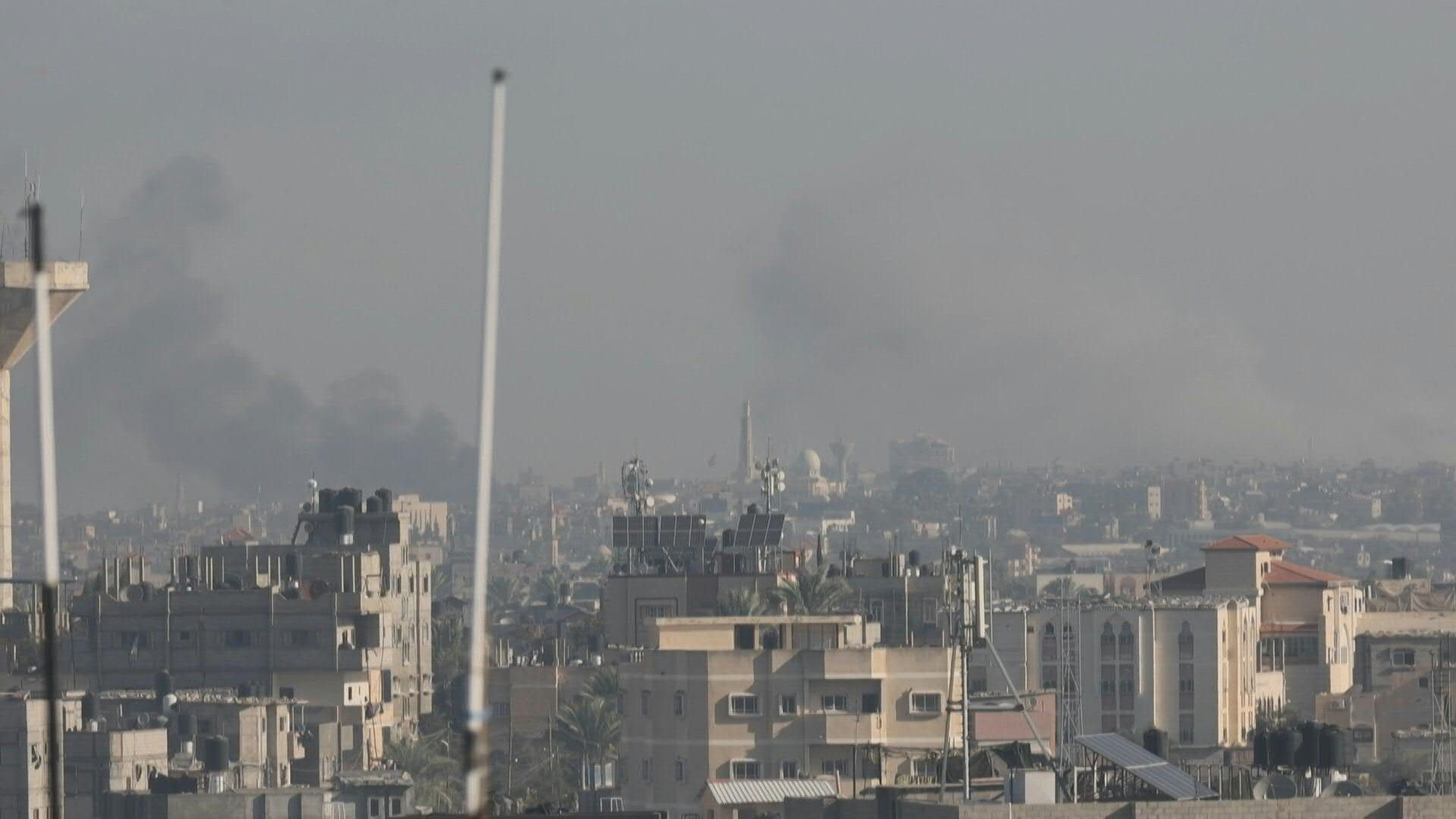 Smoke rises over Khan Yunis, seen from Rafah