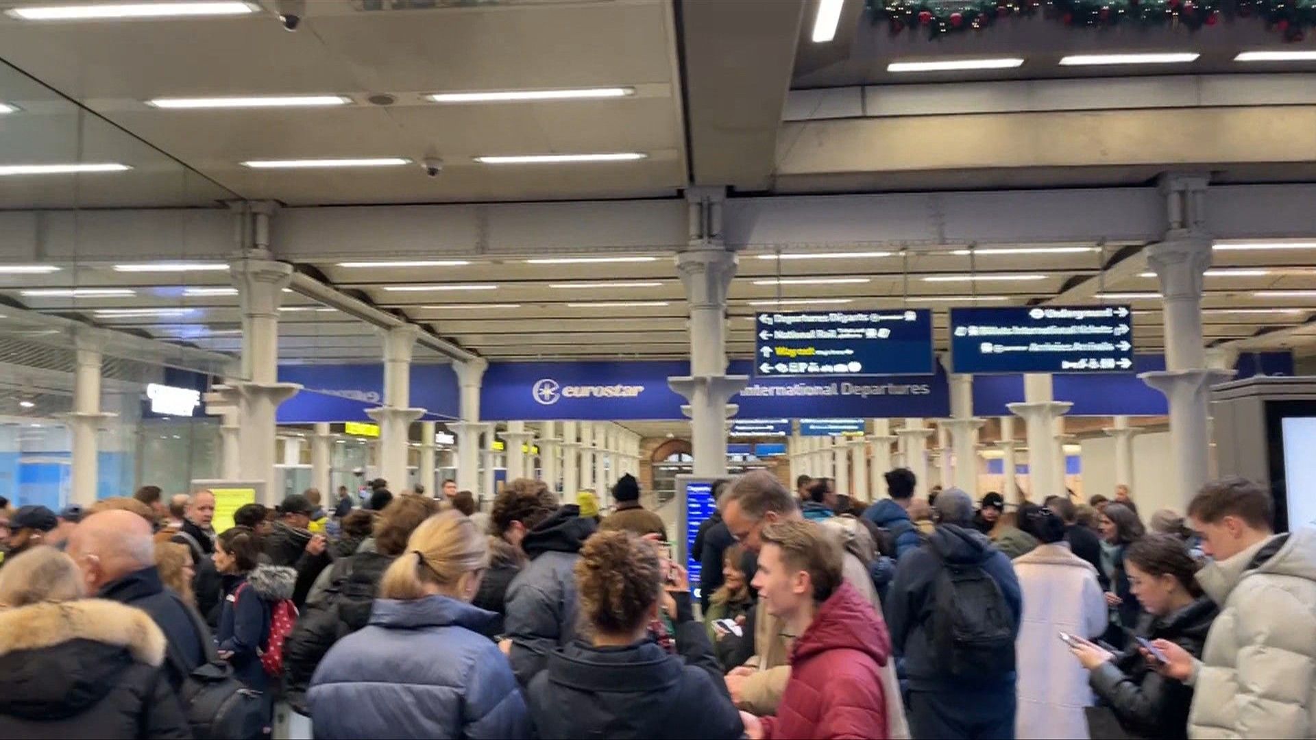 Large crowd waits at London's St Pancras after Eurostar cancellations