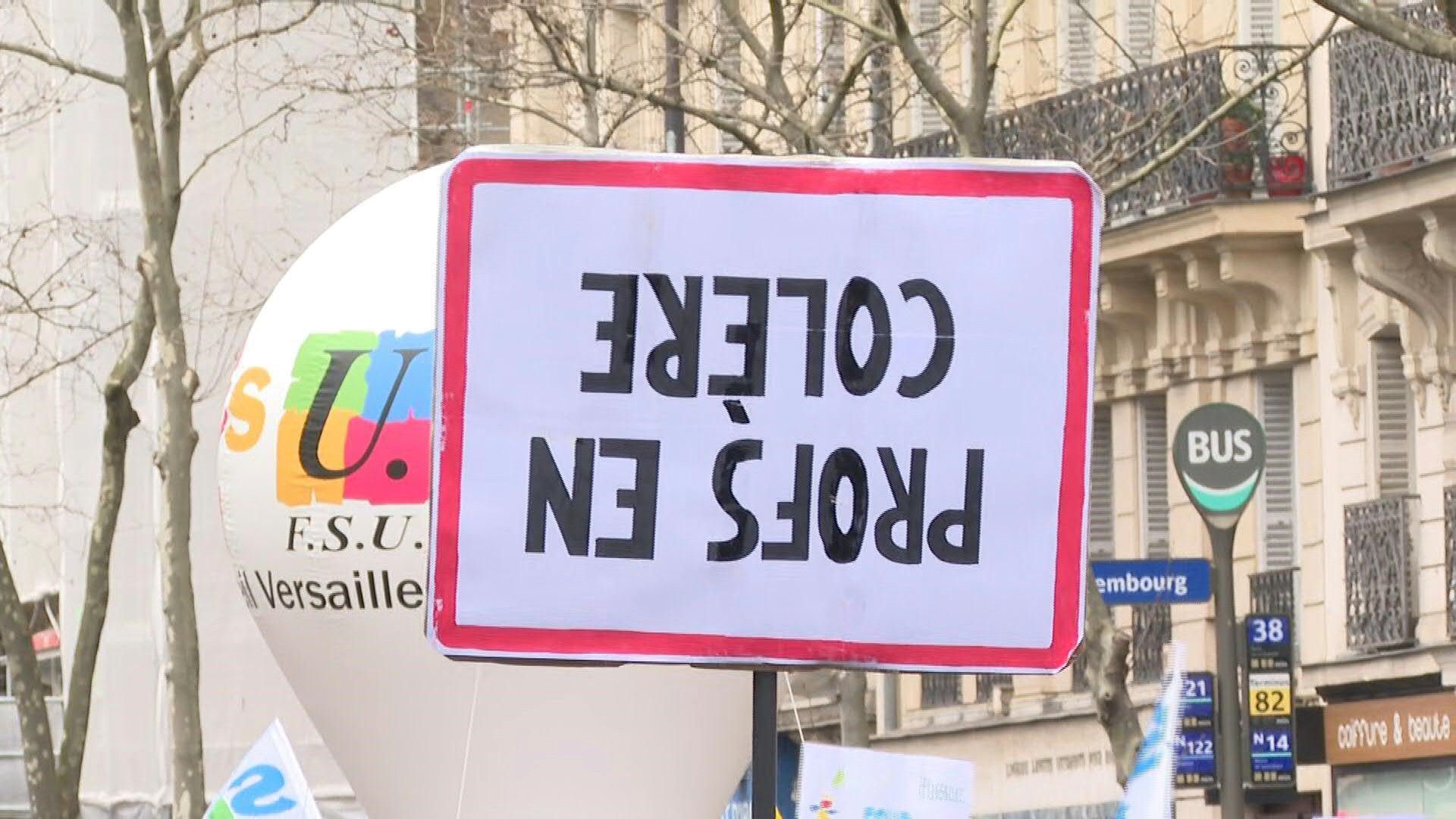 French teachers demonstrate in Paris over pay and work conditions