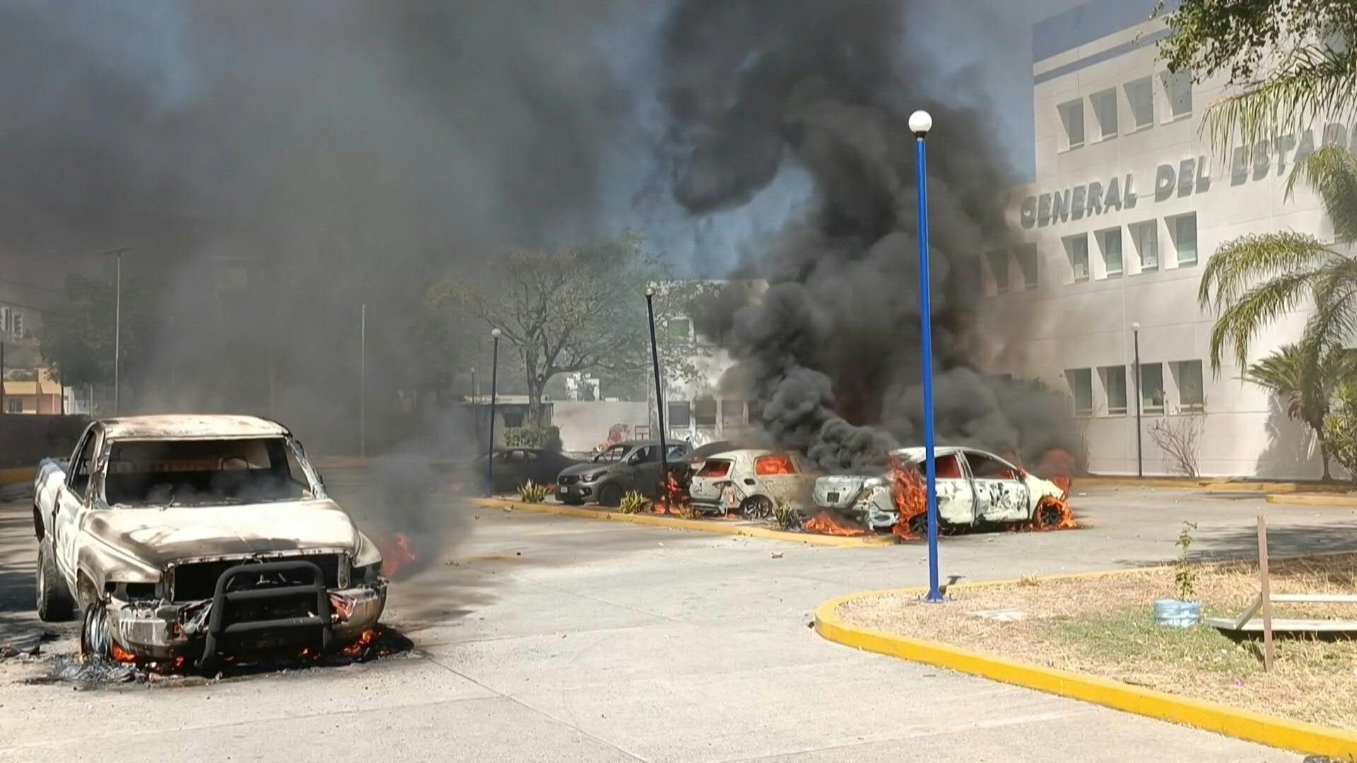 Vehicles on fire outside Mexican prosecutor's office over student death