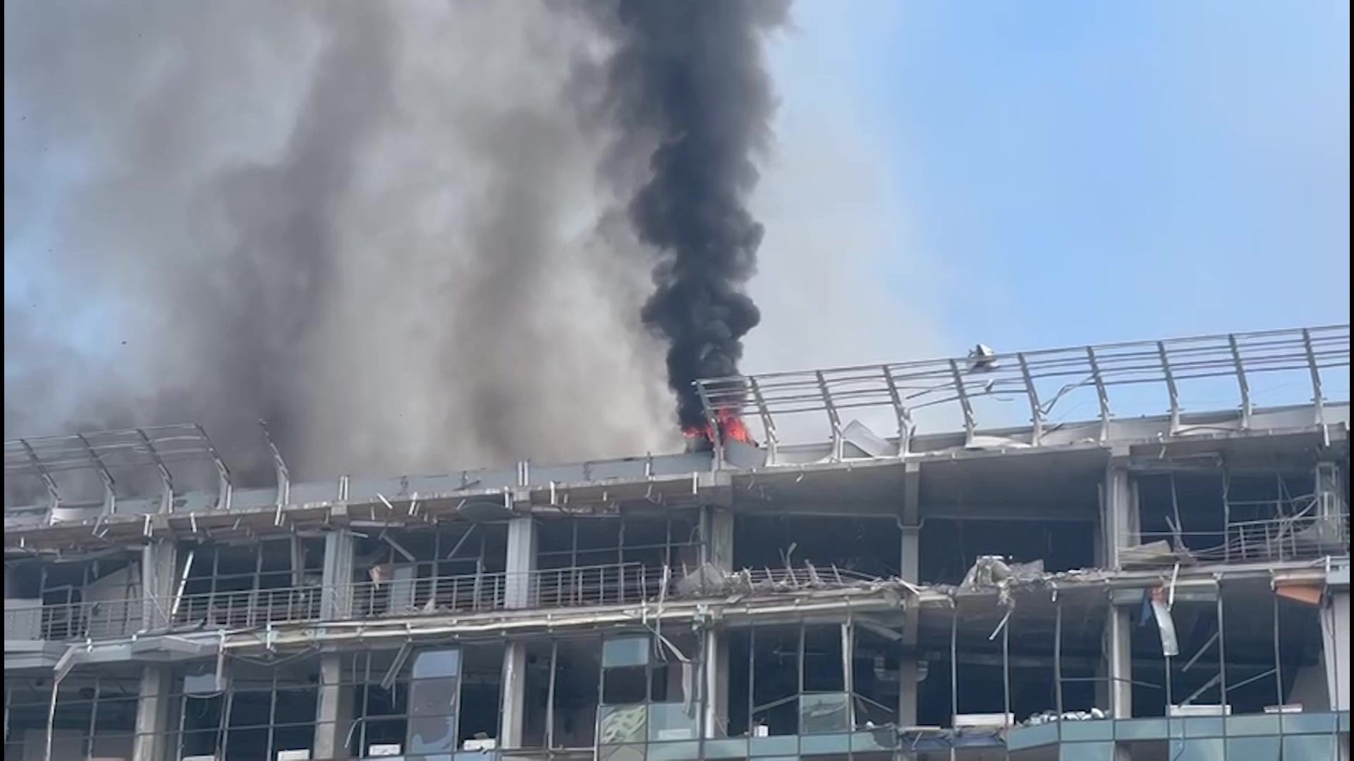 Smoke rises from damaged buildings in Kyiv after Russian attacks