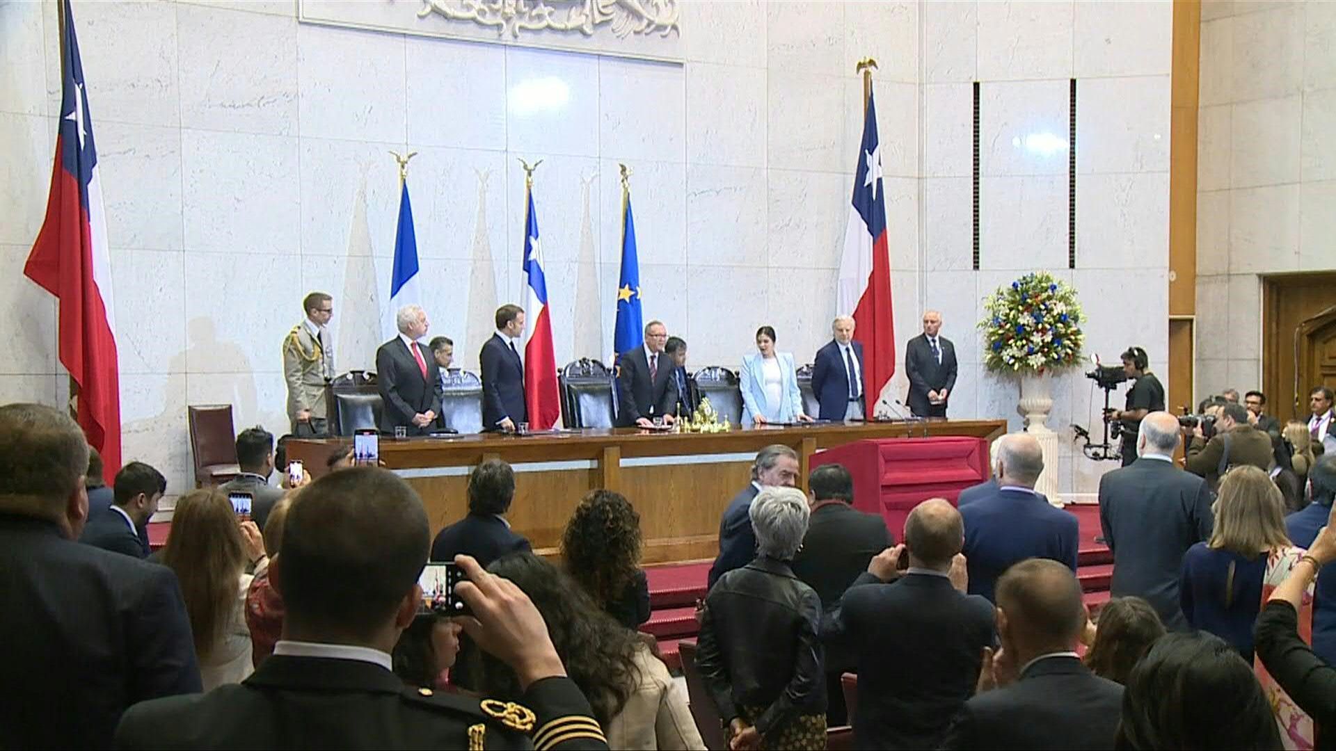 French President Macron welcomed to Chilean Congress during visit