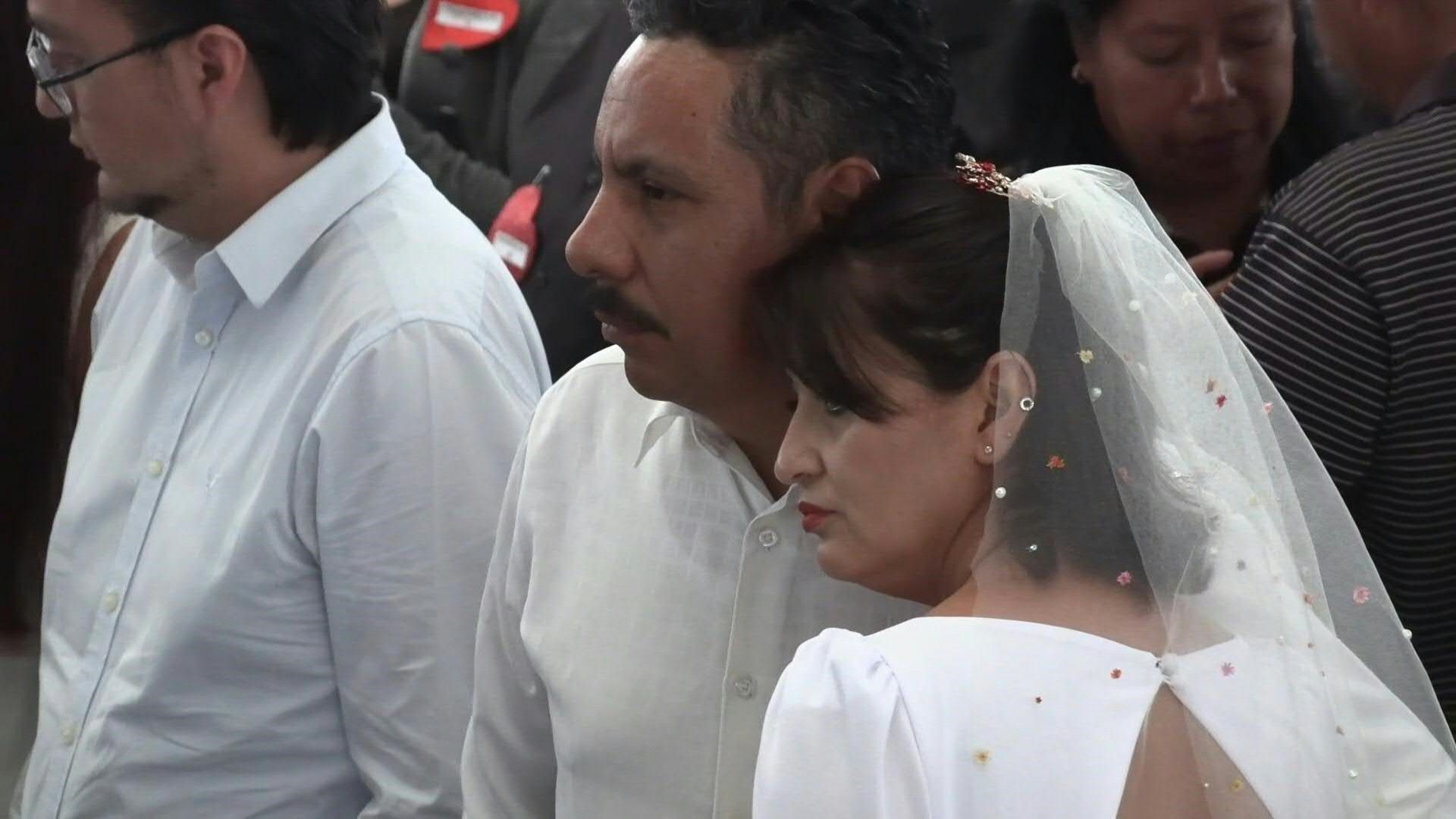 Couples tie the knot in mass wedding ceremony to celebrate Valentine's Day