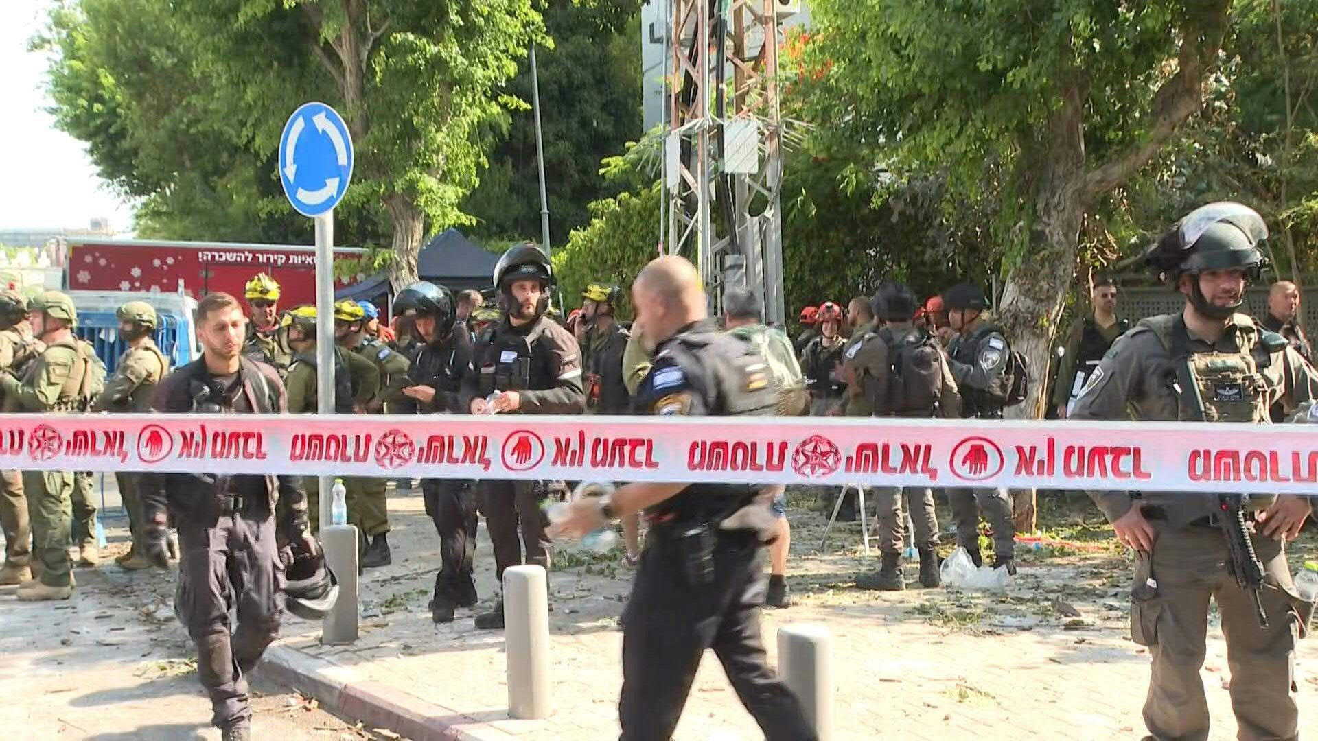 First responders at impact site near Tel Aviv after Iran missiles