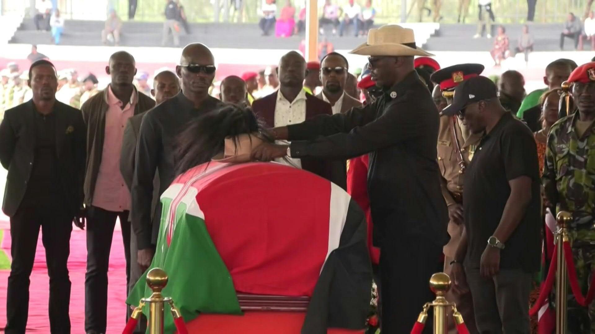 Coffin of politician Odinga arrives at packed stadium in west Kenya