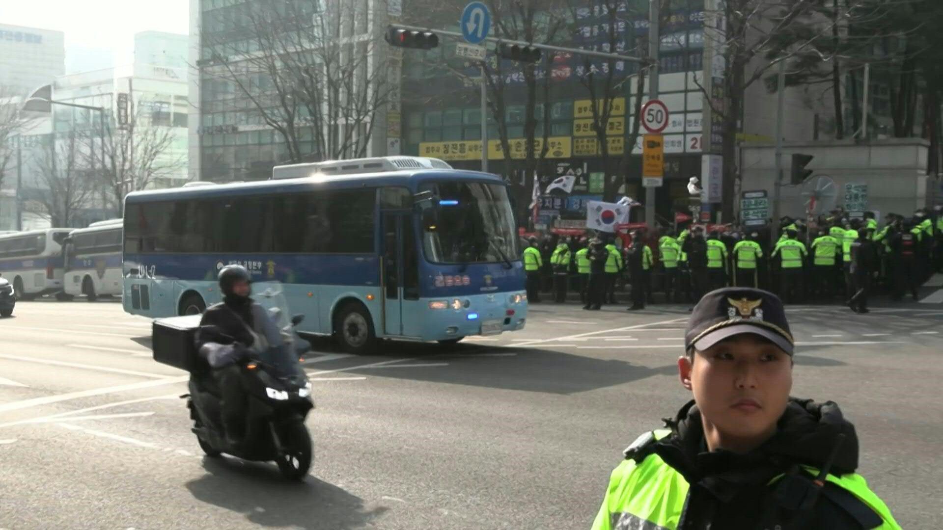 S-Korea-s-ex-leader-Yoon-arrives-at-court-as-he-faces-first-court-verdict