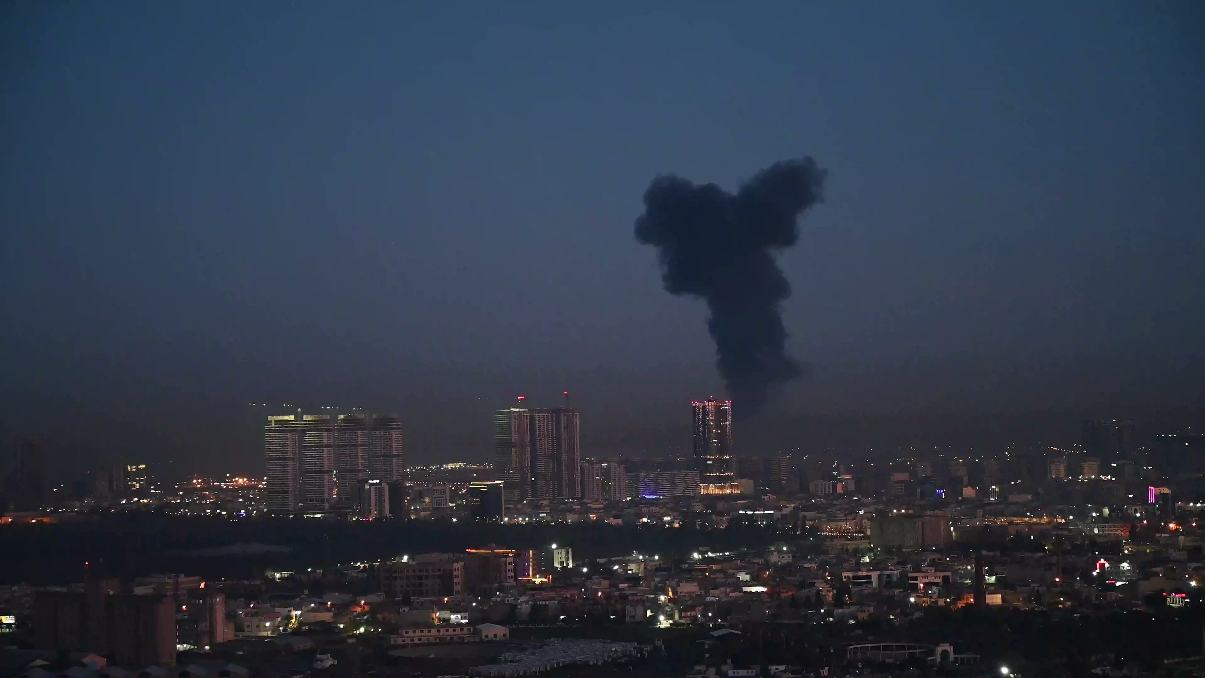 Video: Thick black smoke rising from Iraq airport area hosting US-led troops