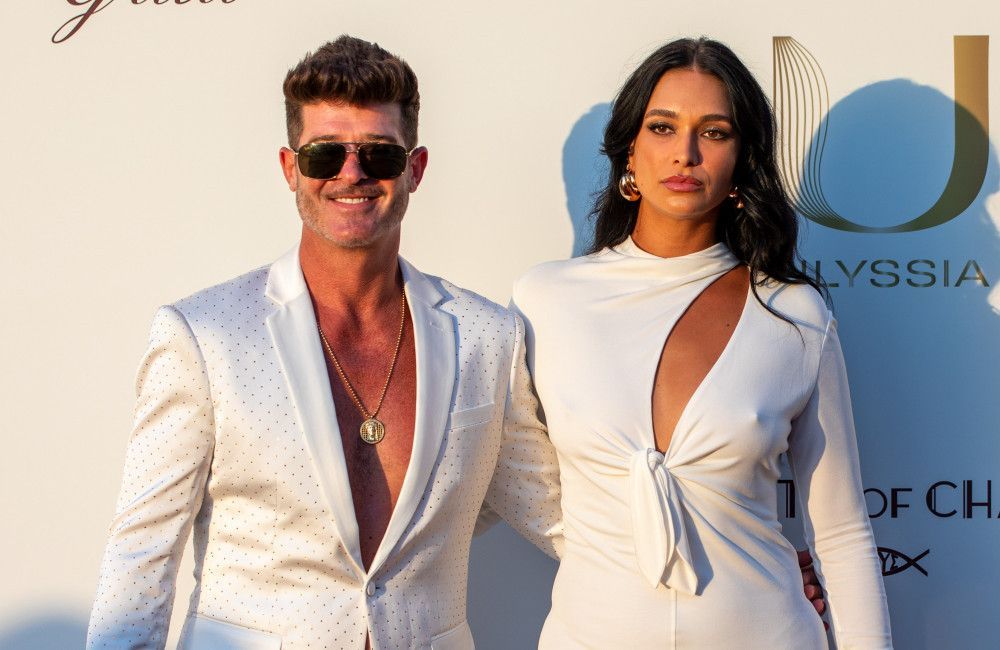 Robin Thicke and April Geary have tied the knot