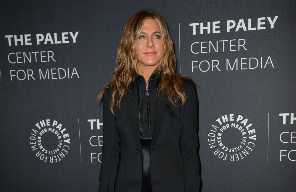 Jennifer Aniston is a "workaholic"