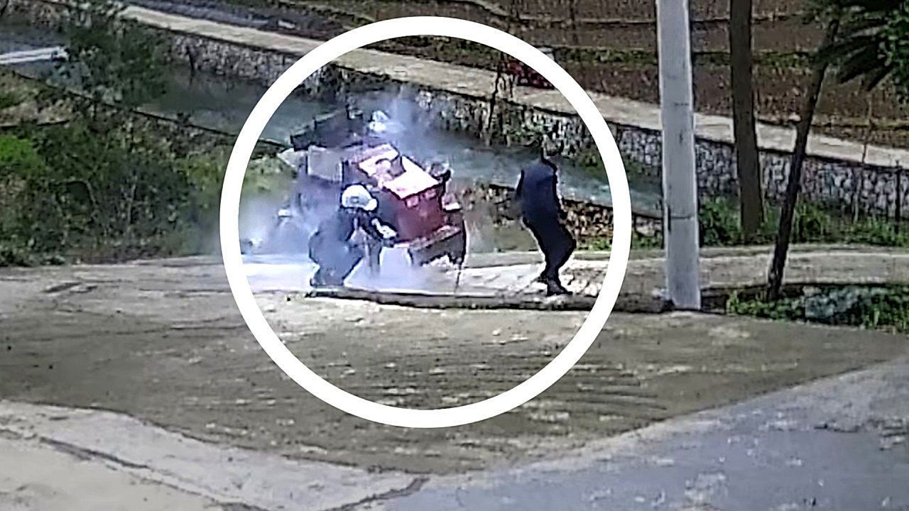 Epic fail! Hapless workers send tractor tumbling down hill in China