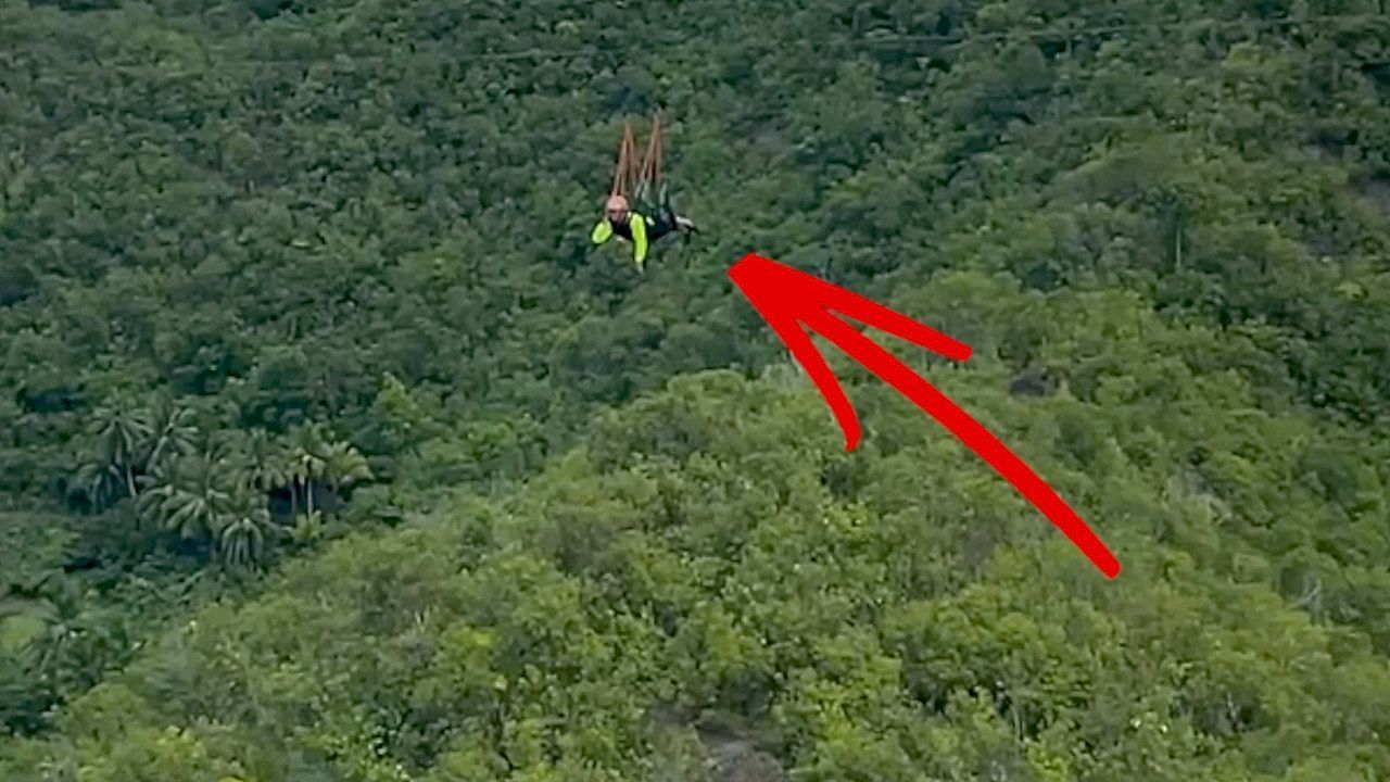 Gegenwind-zu-stark-Tourist-h-ngt-auf-Seilrutsche-150-Meter-ber-dem-Boden-fest