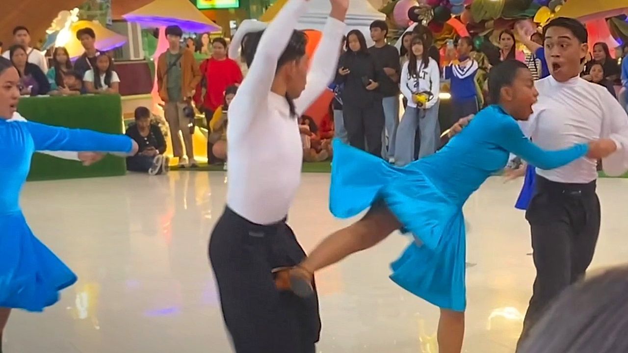 'Reverse kick' surprises teammate during dance routine