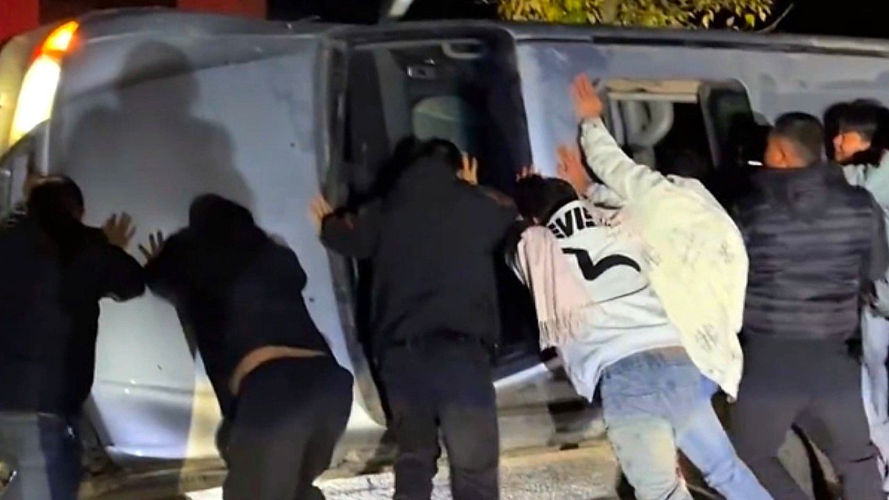 Video: Strangers rush in when a roadside mishap takes a sudden turn