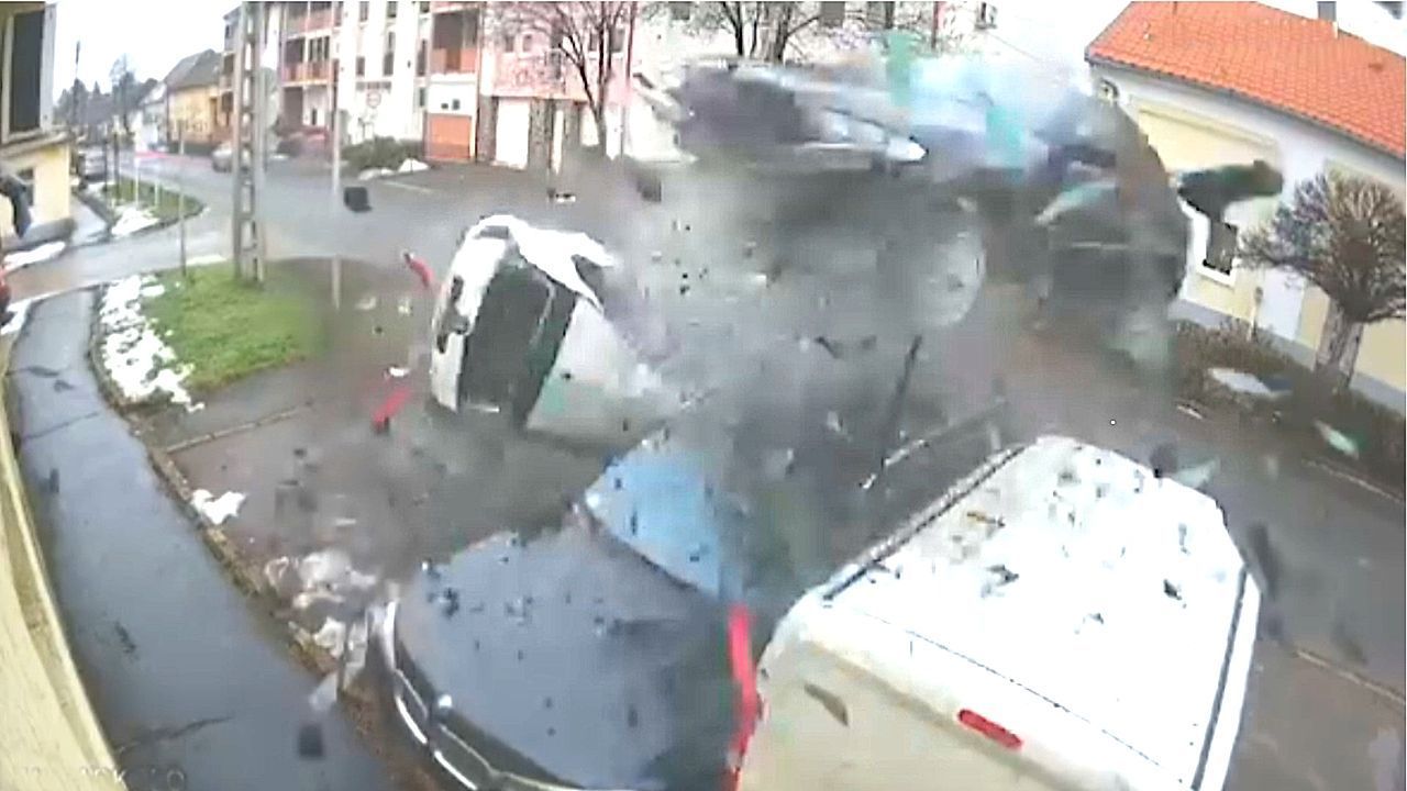Video: Speeding car goes airborne after slamming into parked vehicles