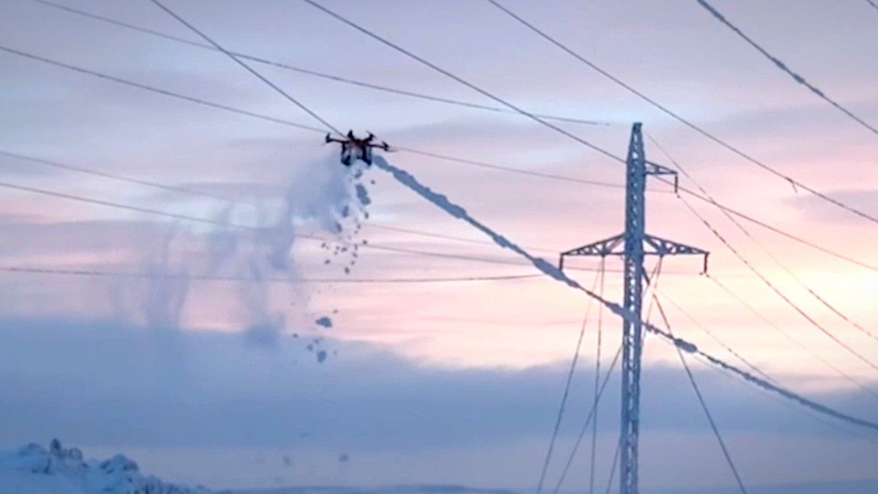 Video: Arctic 'Spider' drone clear live power lines of frozen ice