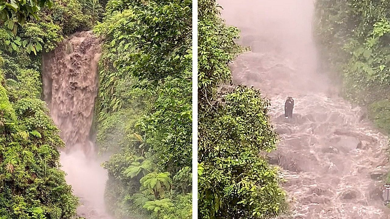 Video: Plötzlich eingeschlossen: Zwei Touristen sitzen bei Sturzflut an Wasserfall fest