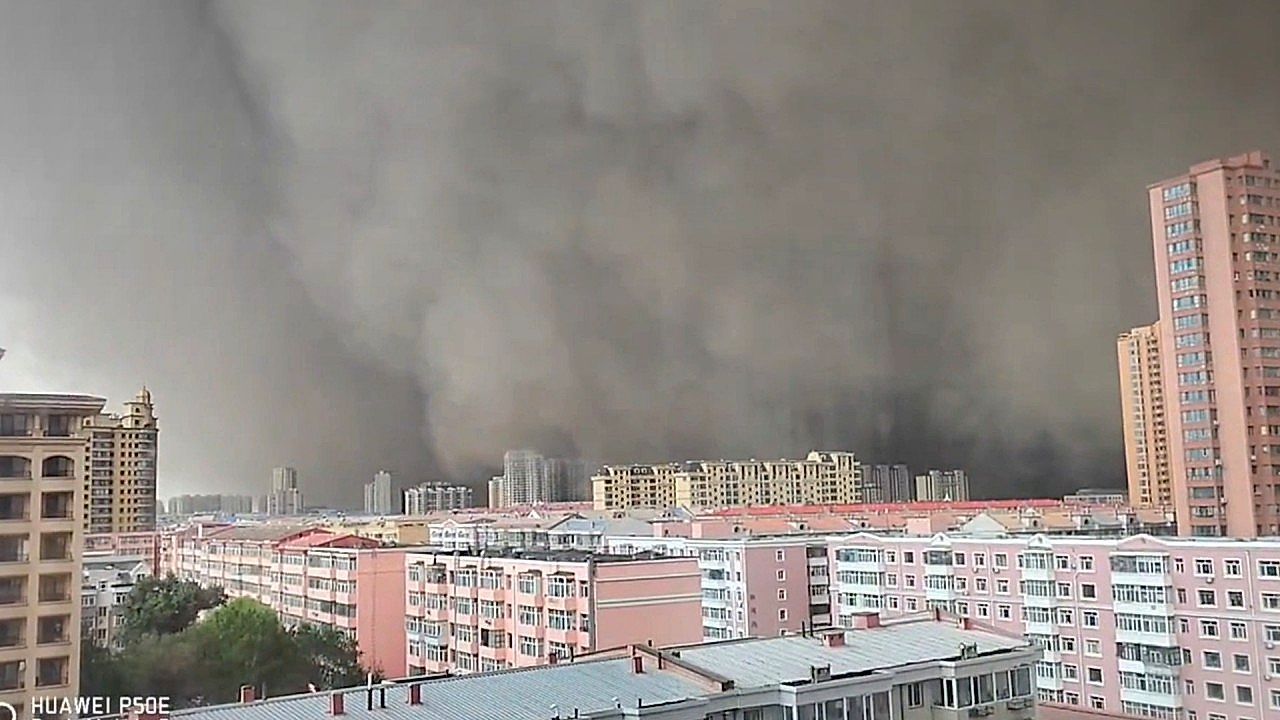 Video: Towering dust storm wall swallows city skyline in China