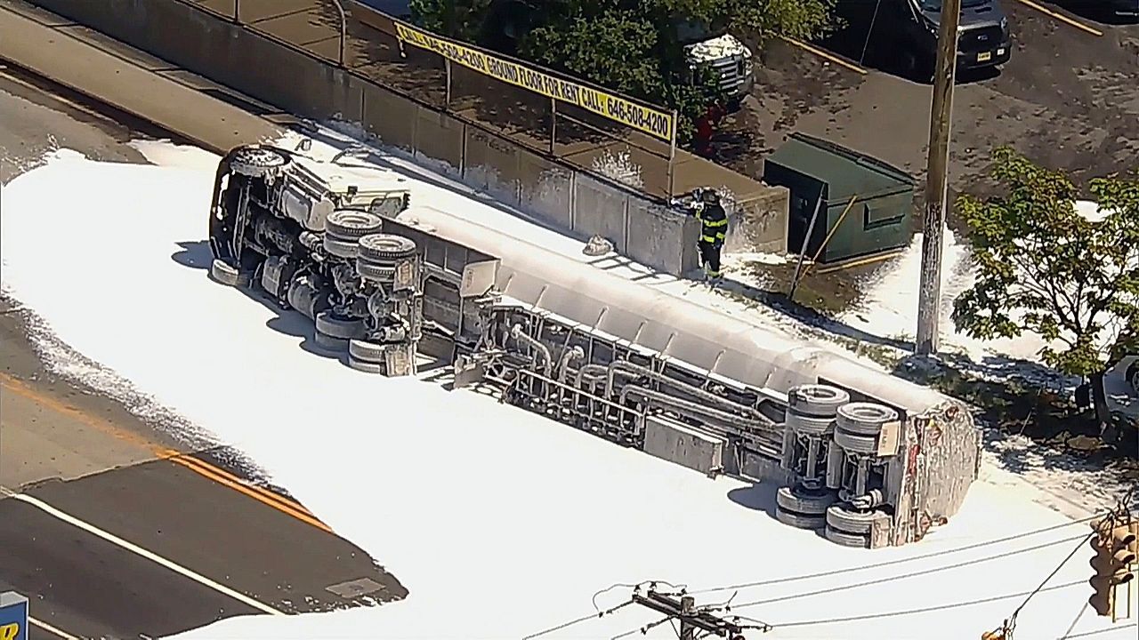 Video: Thousands of gallons of fuel spill out of overturned tanker truck near JFK Airport