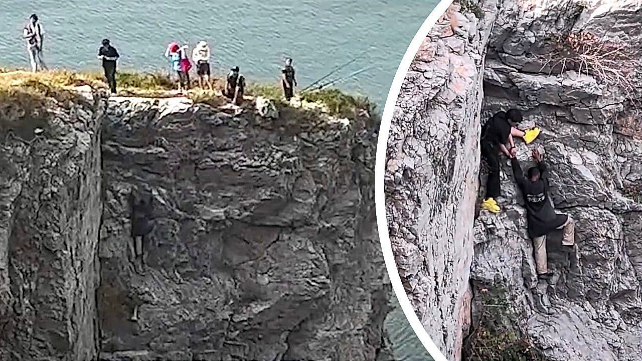 Video: Ohne Seil in die Tiefe: Student rettet erschöpften Mann an Steilklippe in China
