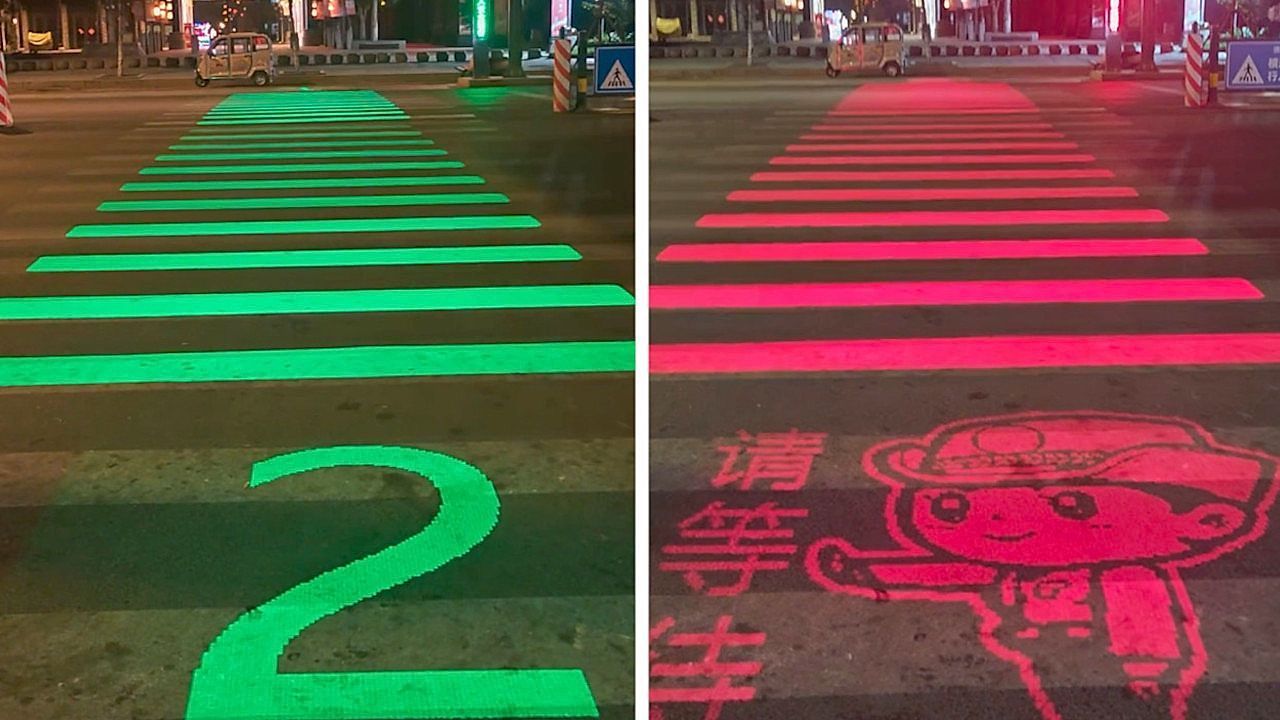 Smart glowing zebra crossing guides pedestrians safely across Chinese street