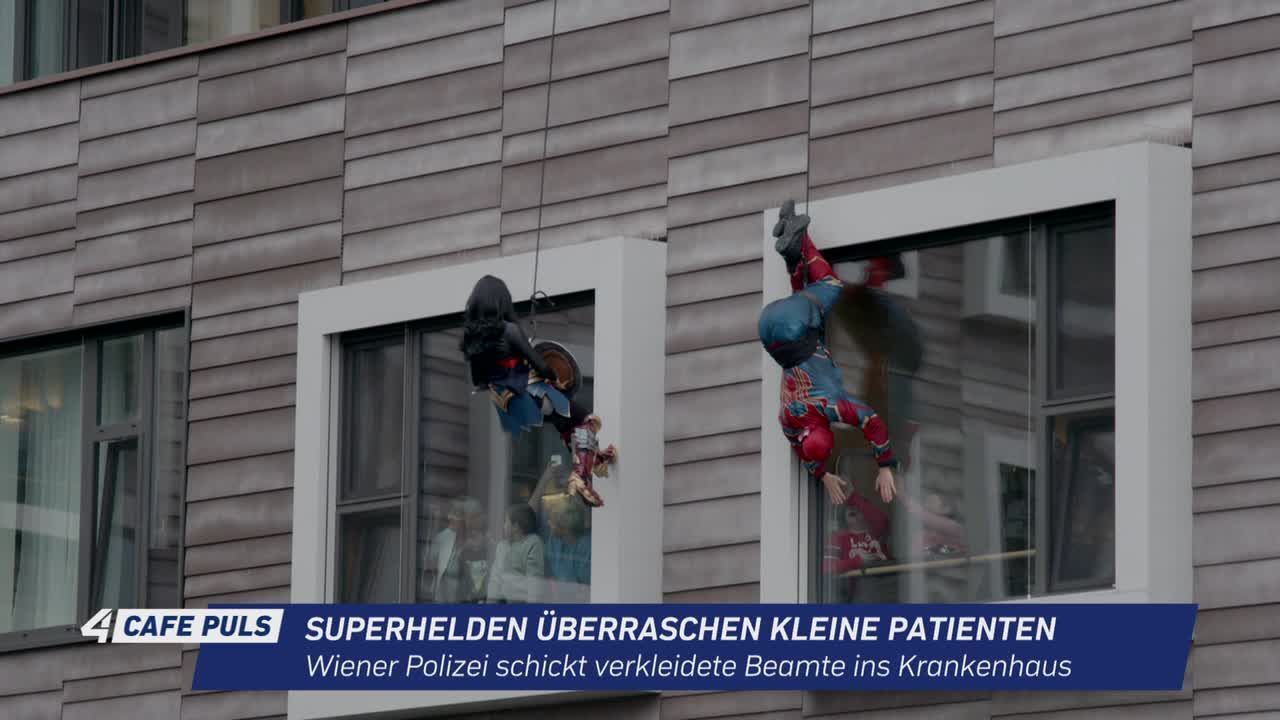 Superhelden überraschen kleine Patienten